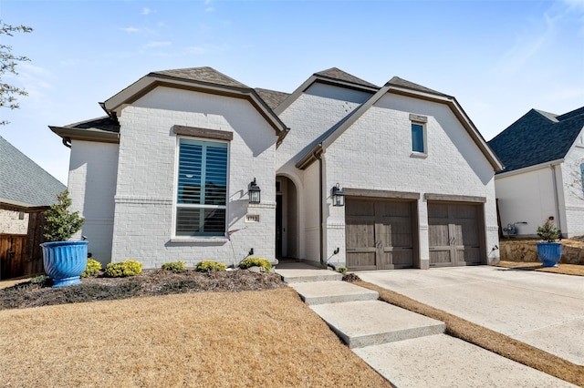 view of front of home with a garage