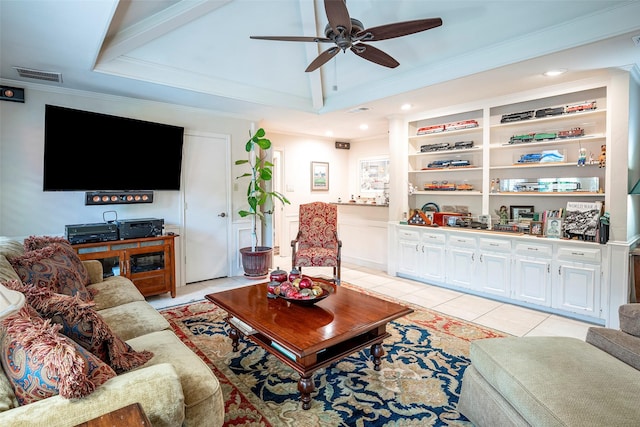 living room with crown molding, light tile patterned floors, and ceiling fan