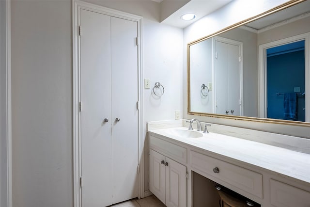 bathroom with vanity and tile patterned floors