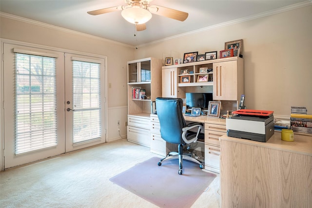 office area featuring french doors, ceiling fan, ornamental molding, and light carpet