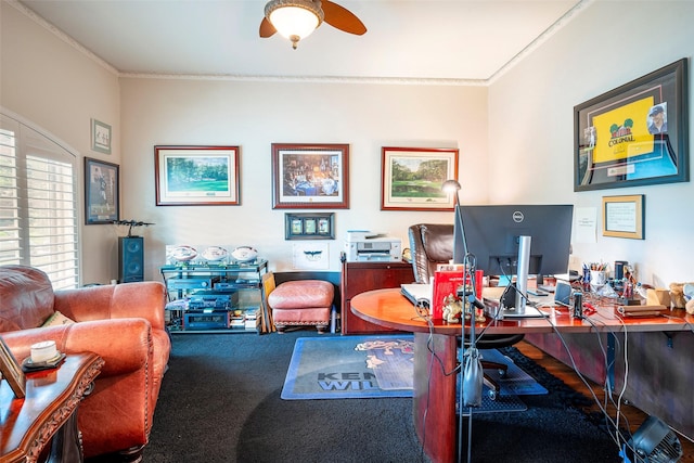 office space featuring crown molding, ceiling fan, and carpet floors