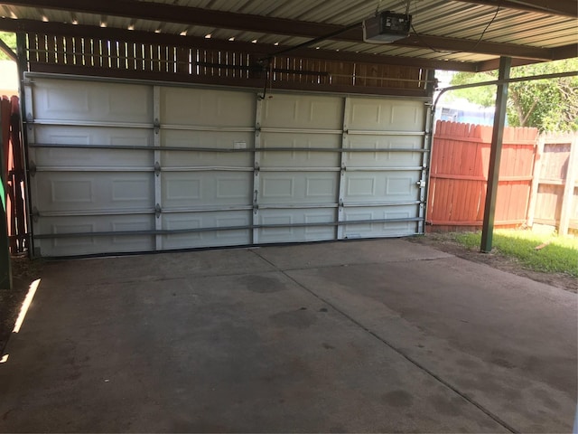 garage featuring a garage door opener