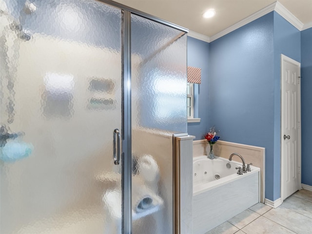 bathroom with tile patterned flooring, ornamental molding, and separate shower and tub