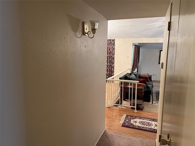 hallway with wood finished floors