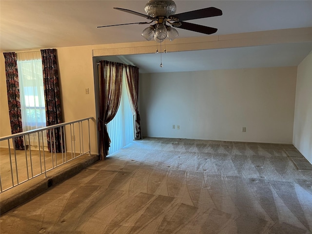 2118 Courtland Cir, Carrollton, TX 75007 - empty room with carpet flooring, a ceiling fan, and plenty of natural light