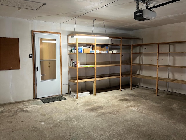 2118 Courtland Cir, Carrollton, TX 75007 - garage featuring a garage door opener