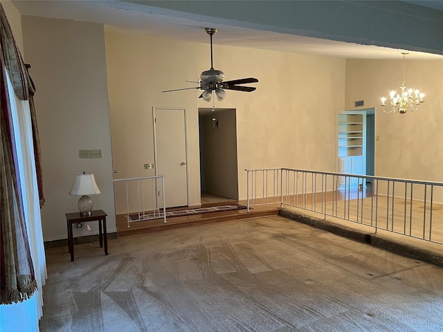 2118 Courtland Cir, Carrollton, TX 75007 - unfurnished room featuring carpet, a chandelier, and ceiling fan