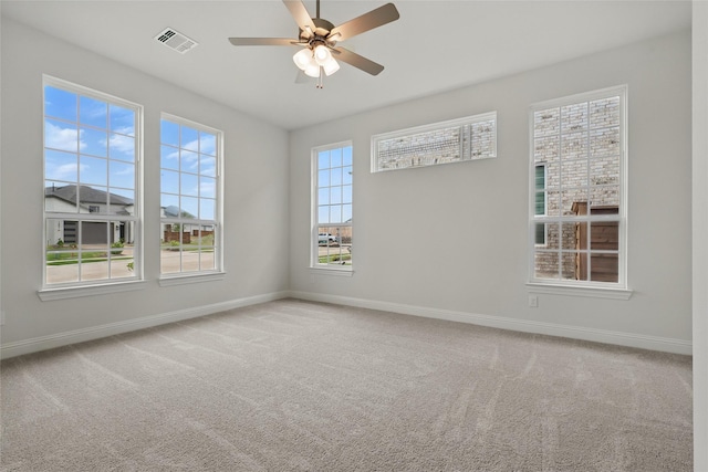 1804 Night Owl Way, Mesquite, TX 75181 - spare room with visible vents, baseboards, ceiling fan, and carpet floors