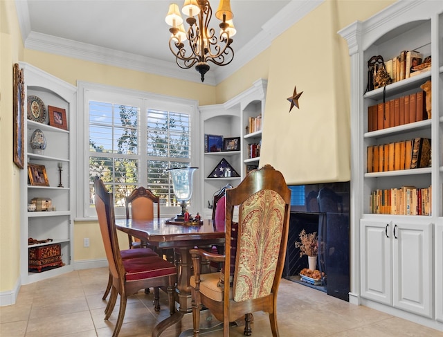 tiled dining area with crown molding, an inviting chandelier, and built in shelves