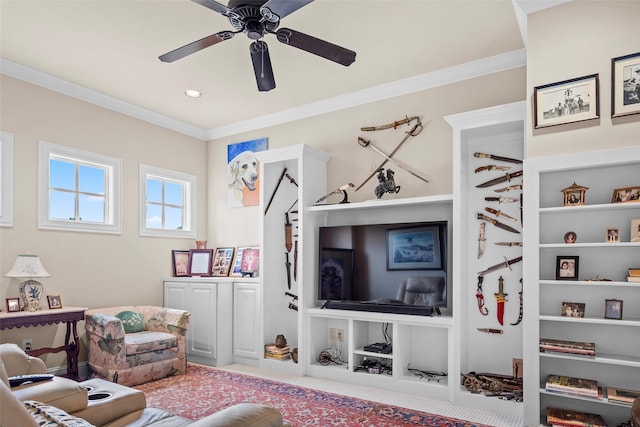 recreation room with ceiling fan, ornamental molding, light colored carpet, and built in features