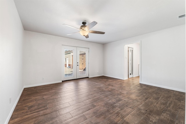 unfurnished room with french doors, ceiling fan, and dark wood-type flooring