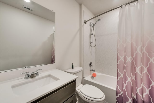 full bathroom with vanity, toilet, and shower / bath combo with shower curtain