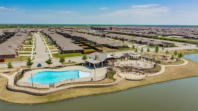 birds eye view of property featuring a water view