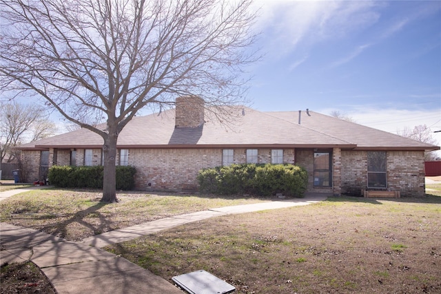 single story home with a front yard