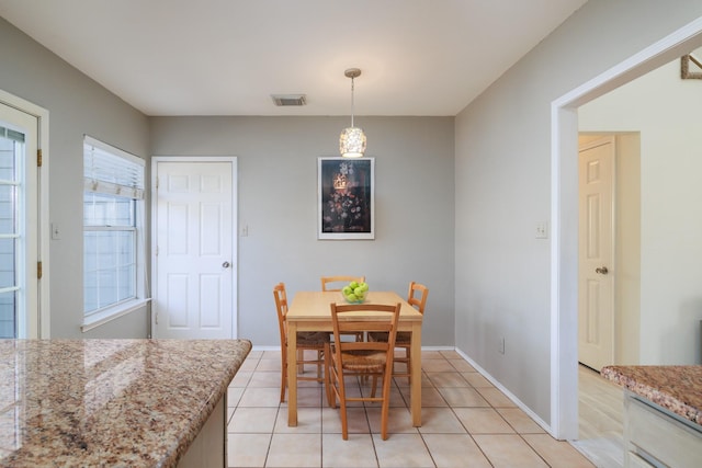 view of tiled dining area