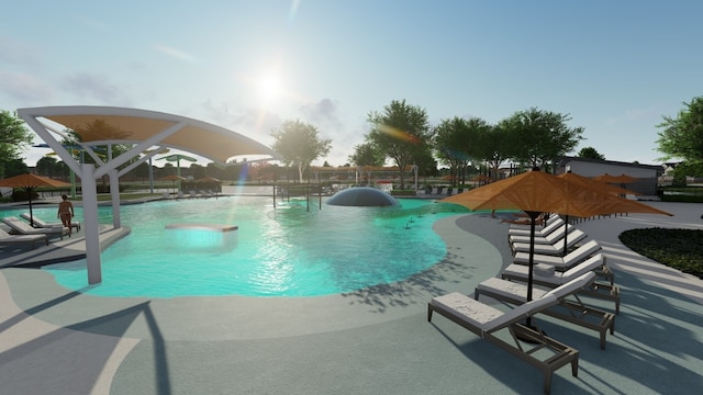 community pool with a patio area