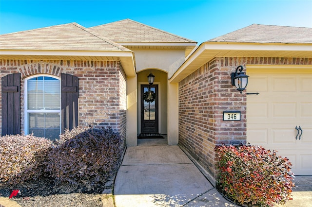 property entrance with a garage