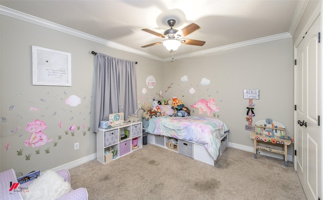 carpeted bedroom with ornamental molding and ceiling fan