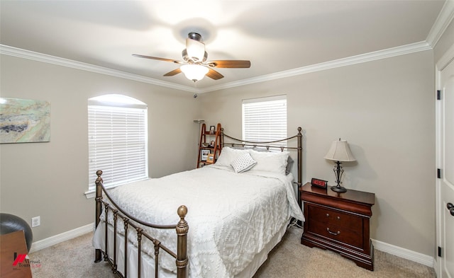 bedroom featuring ceiling fan, light colored carpet, and ornamental molding