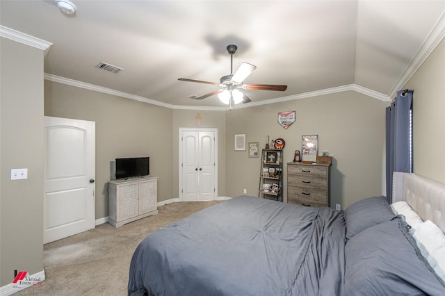 carpeted bedroom with crown molding and ceiling fan