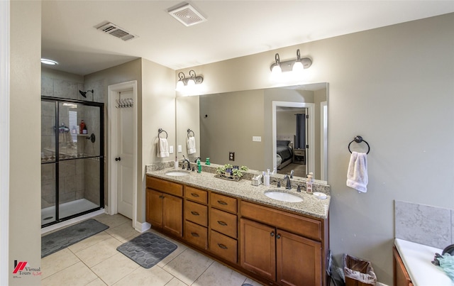 bathroom with vanity, shower with separate bathtub, and tile patterned flooring