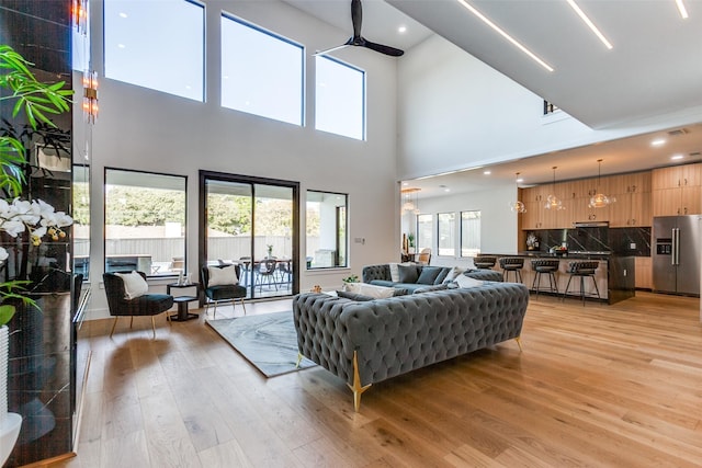 living room with light hardwood / wood-style flooring