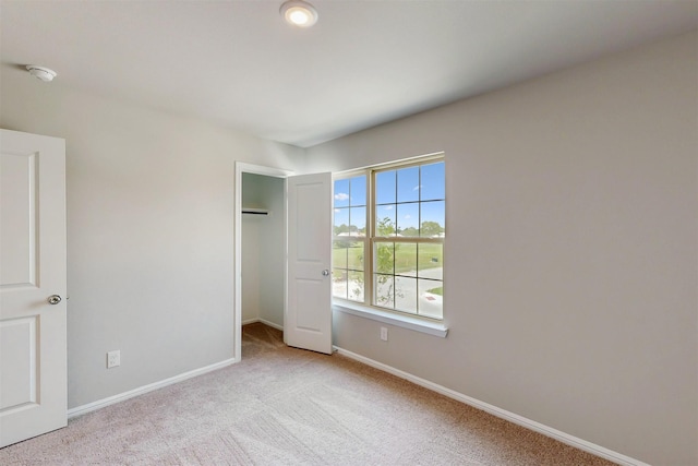 714 Gentle Bird Dr, Lavon, TX 75166 - unfurnished bedroom with baseboards, carpet flooring, and a closet