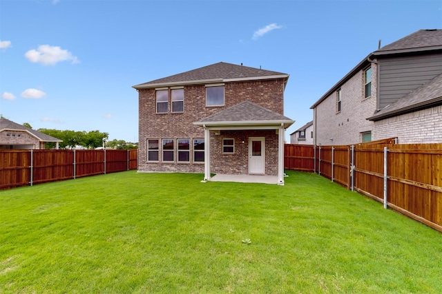 714 Gentle Bird Dr, Lavon, TX 75166 - back of property featuring a fenced backyard, a patio area, a yard, and brick siding