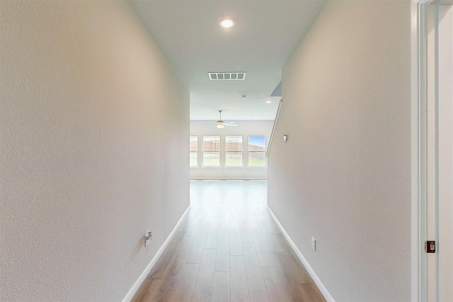 714 Gentle Bird Dr, Lavon, TX 75166 - hall with baseboards, recessed lighting, visible vents, and wood finished floors