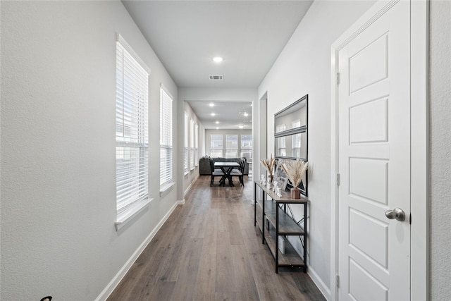 hallway featuring wood-type flooring