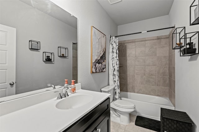 full bathroom featuring tile patterned floors, vanity, toilet, and shower / tub combo