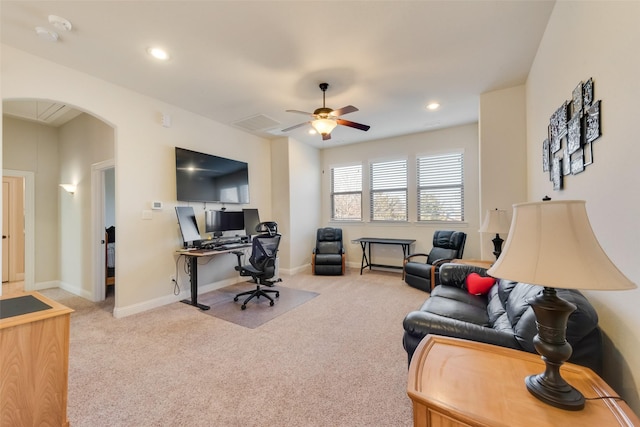 office with ceiling fan and light carpet