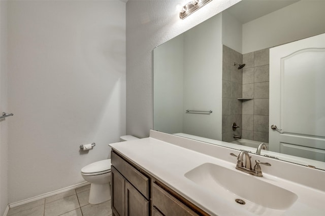 full bathroom with baseboards, toilet, tile patterned floors, walk in shower, and vanity