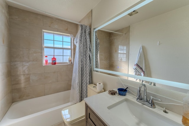 full bathroom with vanity, toilet, and shower / bath combo with shower curtain