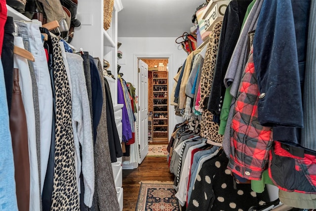 spacious closet featuring wood finished floors