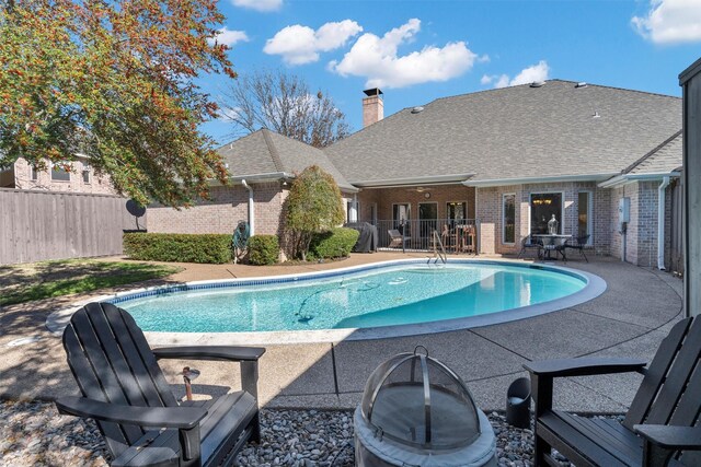 view of patio / terrace with an outdoor fire pit