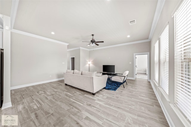 unfurnished living room featuring crown molding, light wood-type flooring, and ceiling fan