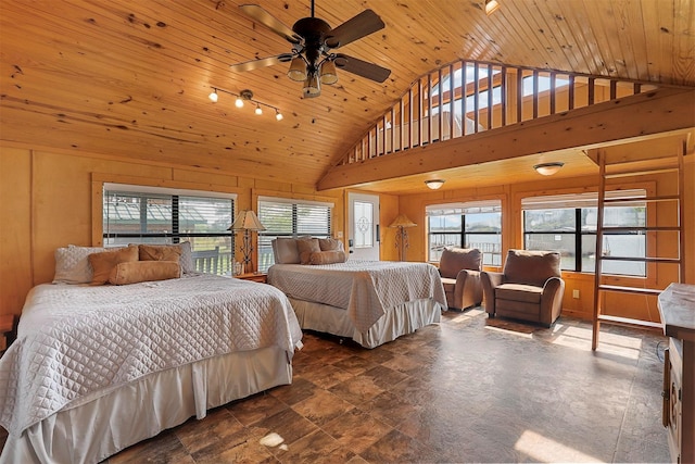 bedroom featuring lofted ceiling, carpet flooring, wooden ceiling, and wood walls