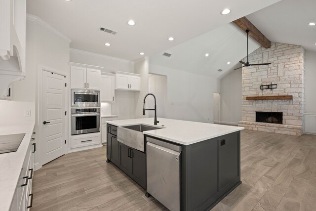 empty room with light hardwood / wood-style flooring and ornamental molding