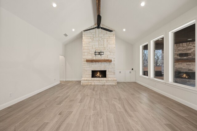 kitchen featuring sink, stainless steel appliances, an island with sink, white cabinets, and decorative backsplash