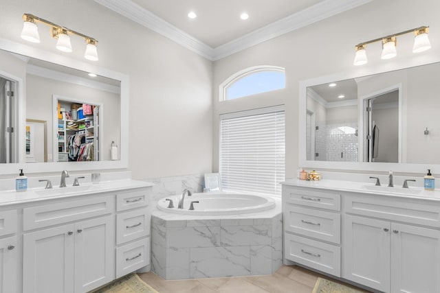 bathroom with ornamental molding, separate shower and tub, tile patterned flooring, and vanity