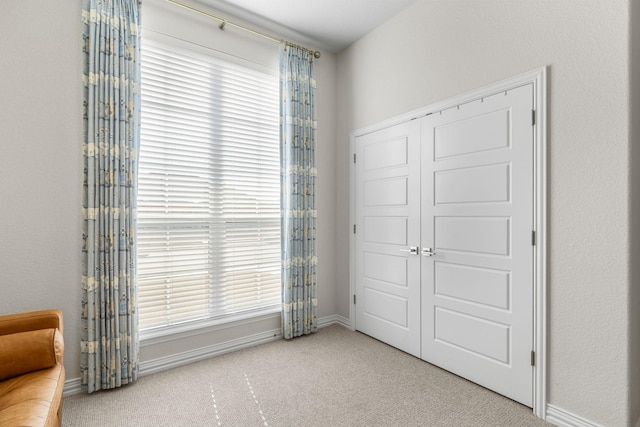 unfurnished bedroom featuring a closet and carpet