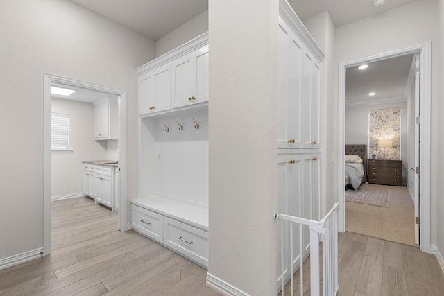 mudroom featuring light wood-type flooring