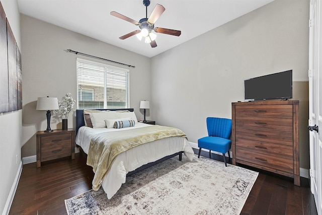 bedroom with dark wood-type flooring and ceiling fan