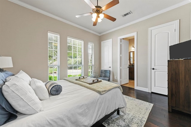 bedroom featuring crown molding, ceiling fan, connected bathroom, and dark hardwood / wood-style floors