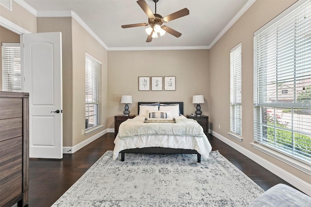 bedroom with crown molding, ceiling fan, and dark wood-type flooring