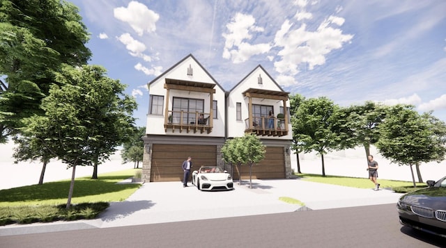 view of front facade featuring a garage and a balcony