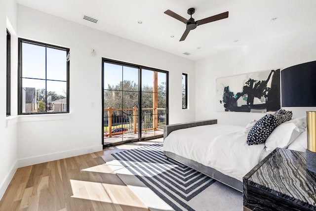 bedroom featuring baseboards, visible vents, access to exterior, light wood-style floors, and recessed lighting