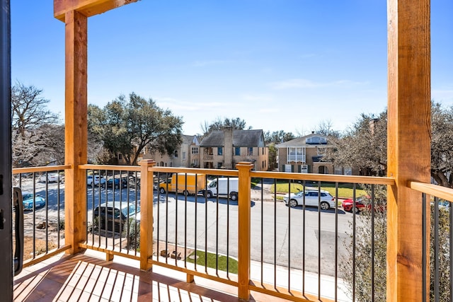 balcony featuring a residential view