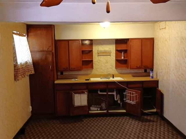 kitchen with ceiling fan and sink